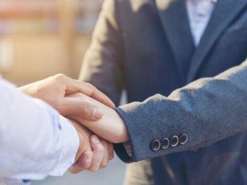 Criminal Lawyer Handshake With His Happy Client