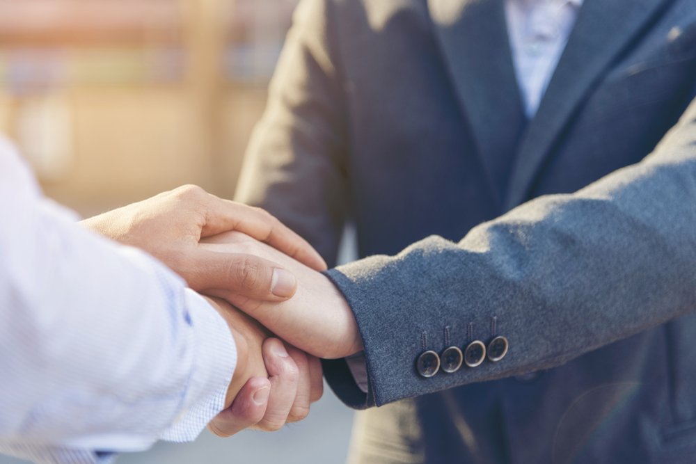 Criminal Lawyer Handshake With His Happy Client